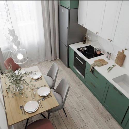 Стильный вариант дизайна квартиры в светлых тонах в сочетании с оттенком зеленого. 06