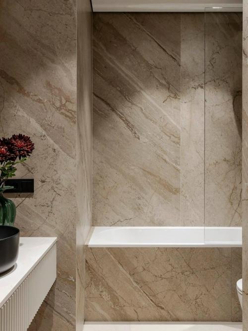 Интерьер этой квартиры создан для молодой пары, увлеченной путешествиями. 05