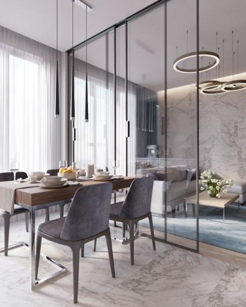 Полностью стеклянная стена- основной элемент, разделяющий зоны кухни и гостиной. 04