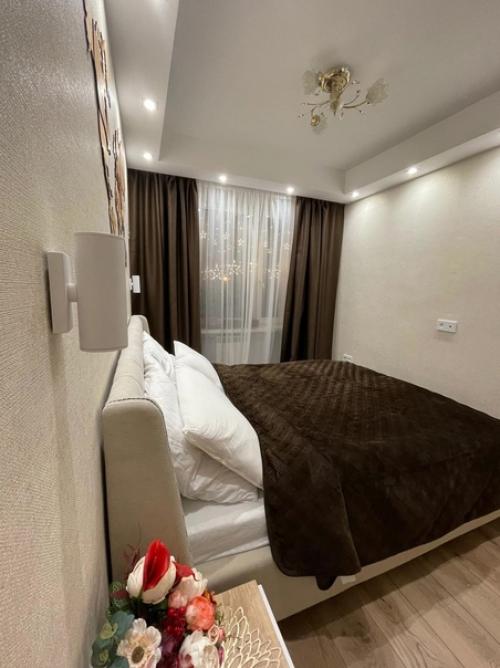 Уютная спальня. В тёплом, коричневом оттенке. 02