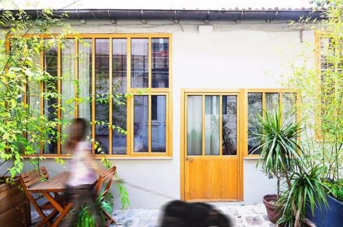 Компактный трехуровневый лофт в центре Парижа. 07