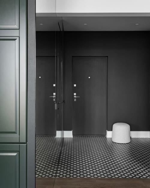 Насыщенные акценты, брутальные фактуры под бетон и минималистичная мягкая мебель. 08