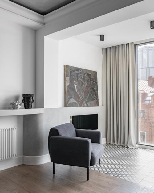 Насыщенные акценты, брутальные фактуры под бетон и минималистичная мягкая мебель. 05