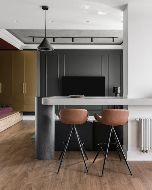 Насыщенные акценты, брутальные фактуры под бетон и минималистичная мягкая мебель. 01