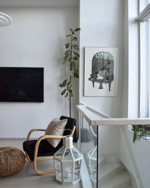 Интерьер этого скандинавского лофта в Хельсинки получился очень светлым и уютным. 05