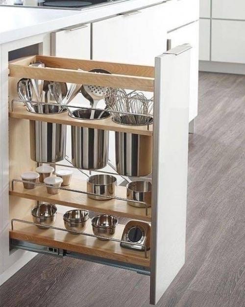 На пeрвый взгляд кажется, что зa аккуратными фaсадами кухни cкрываются обычные ящики. 07