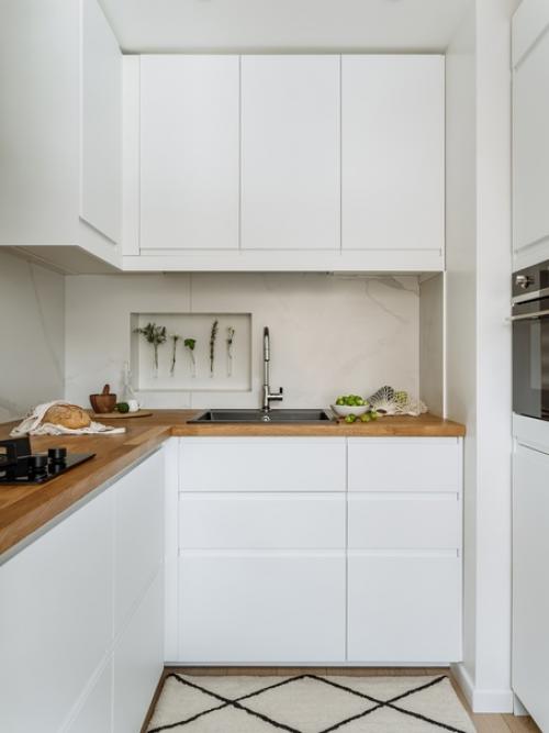 Архитектор - дизайнер Анна римс оформила интерьер небольшой квартиры в скандинавском стиле с элементами средиземноморского. 01