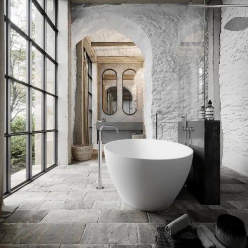 Дерево и камень - одни из самых востребованных в современном интерьере отделочных материалов. 07