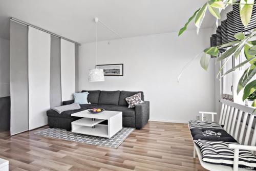 Лаконичный монохромный интерьер однокомнатной квартиры. 04