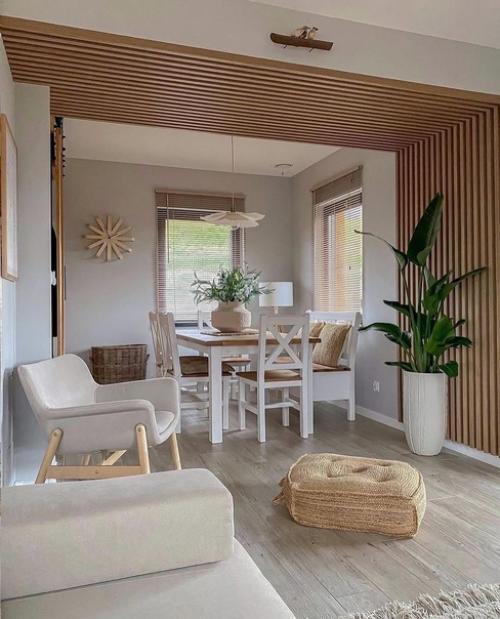 Главная изюминка этого уютного дома - это даже не прекрасная деревянная мебель и стильные деревянные акценты. 02