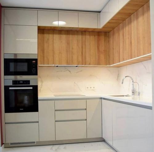 Минимализм не обязательно сделает вашу кухню строгой, аскетичной и безликой. 06