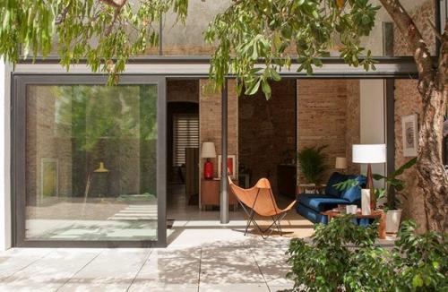 Старинные стены и современный дизайн: лофт молодого бизнесмена в Барселоне. 04