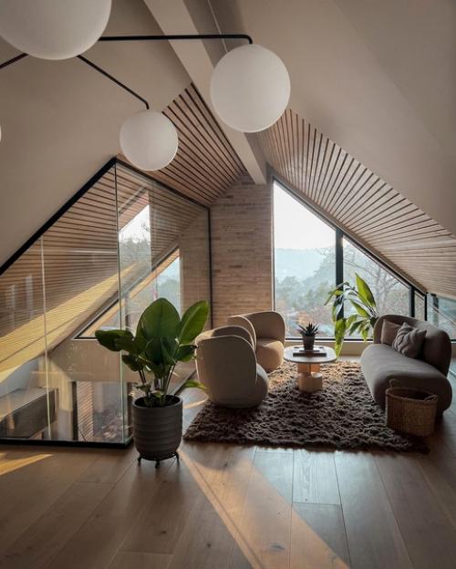 Интерьер этого дома с панорамными окнами в Норвегии основан на мягких и нейтральных природных оттенках. 01