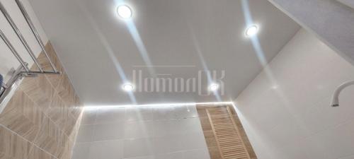 Современное освещение в натяжном потолке - это не только функциональность, но и стильный дизайн. 02