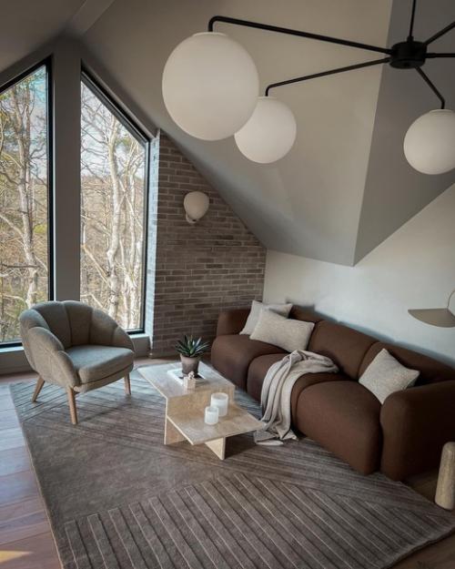 Интерьер этого дома с панорамными окнами в Норвегии основан на мягких и нейтральных природных оттенках. 04