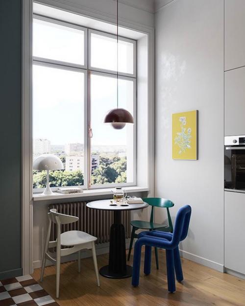 Квартира, в которой ощущается тепло и уют, а основное пространство залито светом благодаря большим окнам. 03