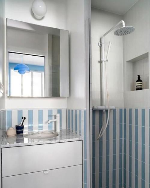 Яркий интерьер компактной квартиры - студии в Париже. 05