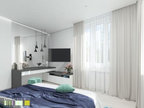 Спальня в современном стиле сделана с акцентом на насыщенный синий цвет, в котором выполнено изголовье кровати. 02