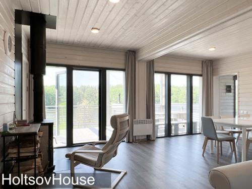 Интерьеры дома из предыдущей публикации - растущий из 4 модулей, большая кухня - гостиная (34 кв. 01