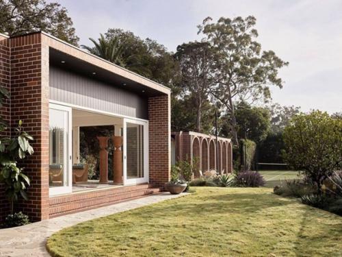 Изящные архитектурные детали и утонченный современный декор: дом в Сиднее. 05