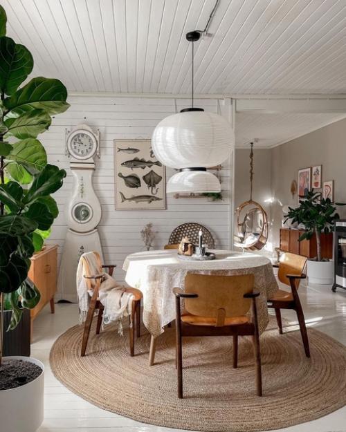 Дом в скандинавском стиле с винтажной мебелью и зелёными растениями. 04