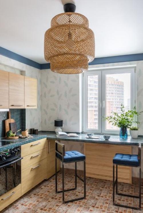 Двухкомнатная квартира со множеством деталей синего цвета и природными мотивами. 05