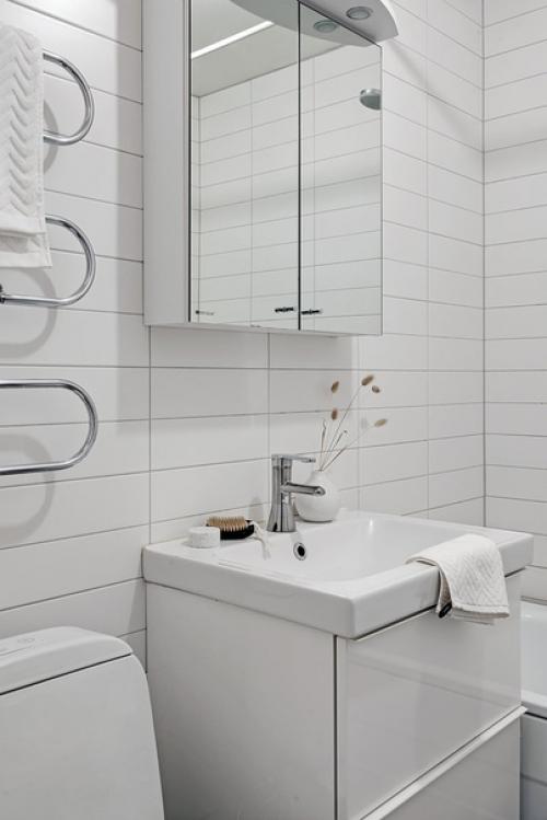 Небольшая скандинавская квартира с кирпичной стеной (53 кв. 08