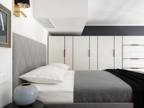 Интерьер двухуровневой студии 27 кв. 06