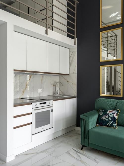 Интерьер двухуровневой студии 27 кв. 01