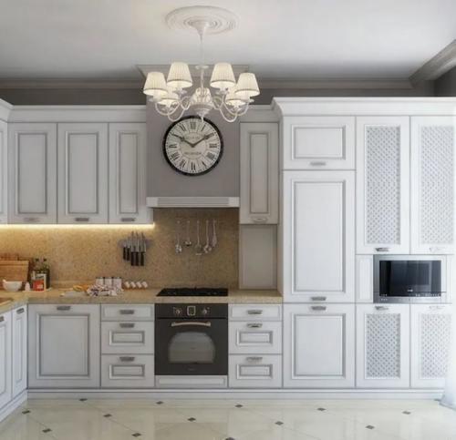 Светлый, торжественный, с вкраплением золота, интерьер кухни в стиле неоклассика. 02