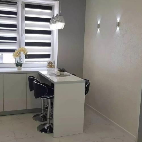 Квартира, оформленная в светлых тонах, выглядит элегантно и свежо, к тому же такой дизайн прекрасно комбинируется с любыми цветовыми решениями. 05