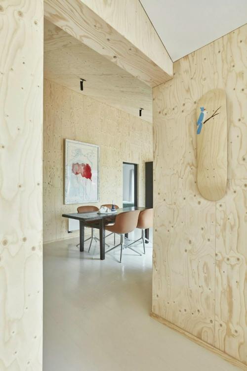 Интерьер этого летнего дома - пример того, как искусство может стать частью повседневной жизни. 03