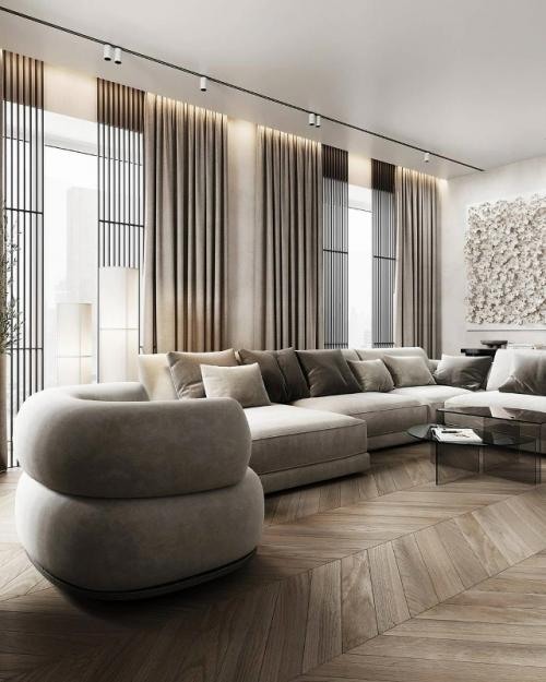 Просторная кухня - гостиная выполнена в светлых тонах.  