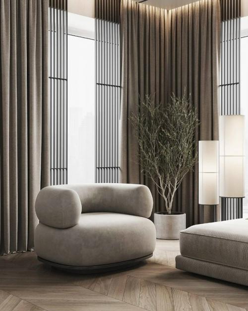 Просторная кухня - гостиная выполнена в светлых тонах. 06