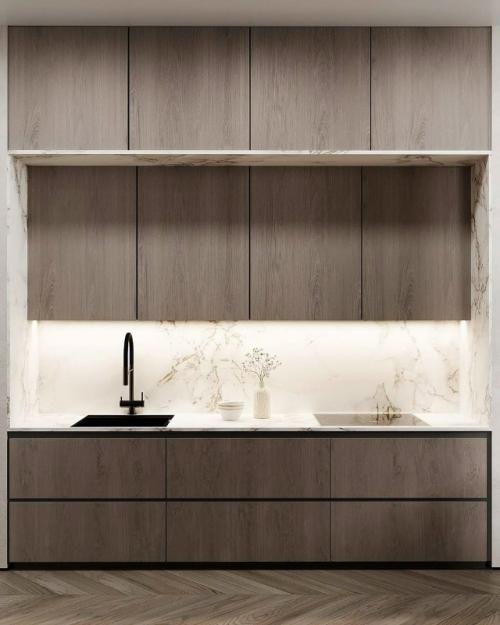 Просторная кухня - гостиная выполнена в светлых тонах. 09