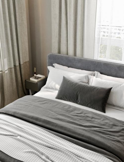 Спальня в квартире в ЖК Союзный оформлена в спокойных нейтральных тонах с акцентом на минимализм и уют. 02