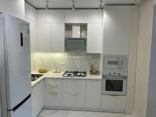 Сочетание белого и золотого - один из трендов в интерьере, который называют Бело - Золотой Гламурный шик! 02