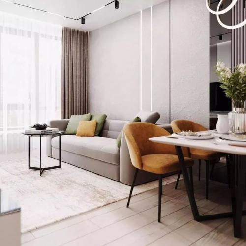 Грамотно созданный баланс между темным и светлым, с вкраплениями ярких акцентов создает неповторимый интерьер кухни - гостиной площадью 18 м. 05