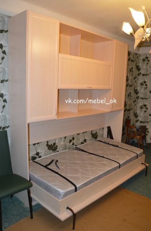 Комфортабельная односпальная кровать, которая складывается в пространство большого вместительного шкафа. 01