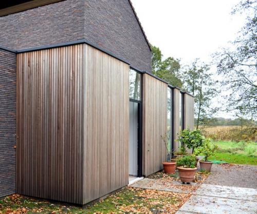 Жилой дом Kiekens, спроектированный бельгийской архитектурной студией Hulpia, возведен на зеленом участке в городе алтер в восточной фландрии. 08