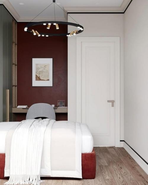 Дизайн интерьера однокомнатной квартиры выполнен в сдержанных, насыщенных тонах. 07