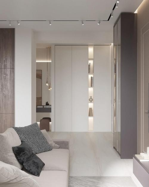 Интерьер гостиной. Тёплые спокойные тона, чёткие линии отделки и мебели. 09