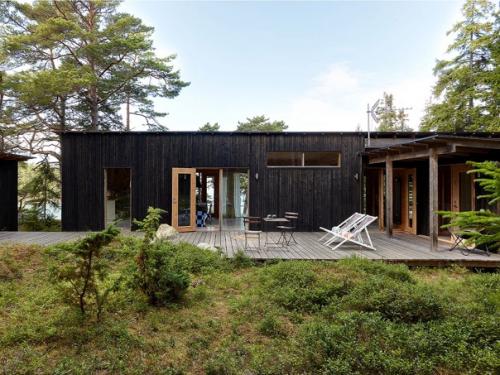 Скандинавская летняя хижина с текстилем финского бренда Marimekko. 07