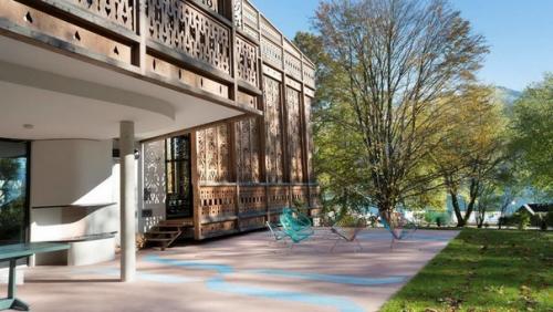 Дом с декоративным деревянным экраном в Австрии. 03