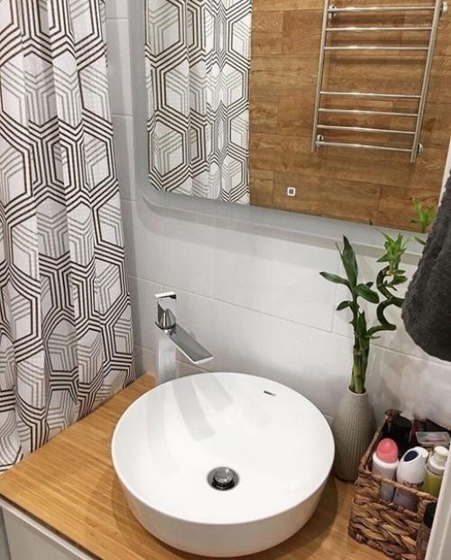 Отличный способ визуально разделить комнату на зону готовки и гостиной с помощью барной стойки. 08