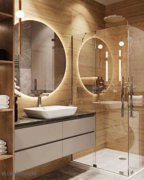 Ванная комната. 
В данном проекте было принято решение по смешиванию холодной текстуры мрамора с теплой текстурой дерева!  