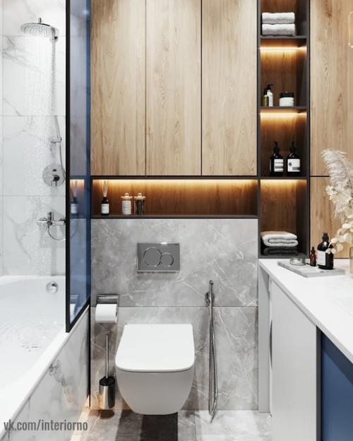 Ванная комната.  В данном проекте было принято решение по смешиванию холодной текстуры мрамора с теплой текстурой дерева! 05