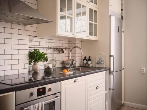 Уютная скандинавская квартира в шведском доме 1920-х годов постройки с прекрасным видом из окон. 03