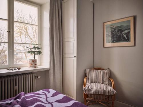 Уютная скандинавская квартира в шведском доме 1920-х годов постройки с прекрасным видом из окон. 02