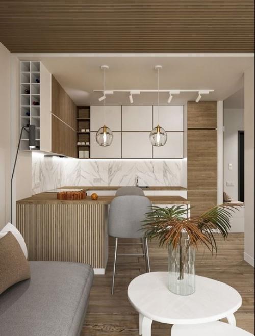 Современный, актуальный, комфортный и легкий интерьер кухни - гостиной в квартире молодой женщины. 02